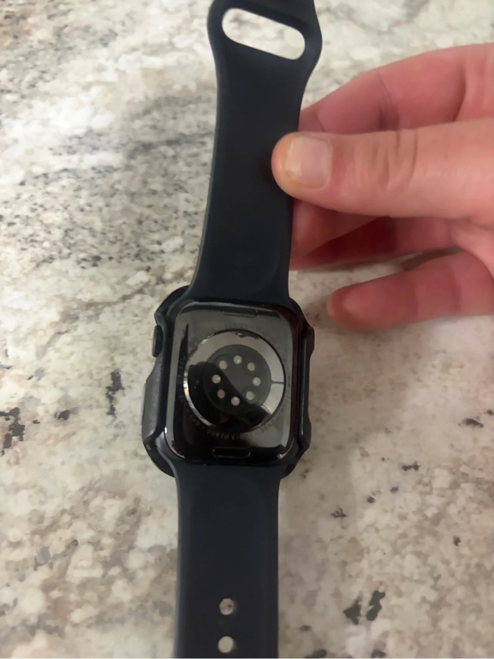 Apple Watch with Black Sport Band and otterbox Case